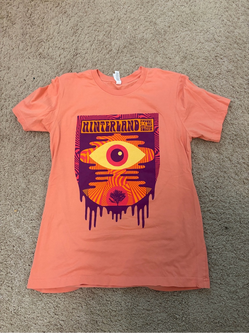 Bella Canvas Coral Tee with Purple and Yellow Eye Graphic